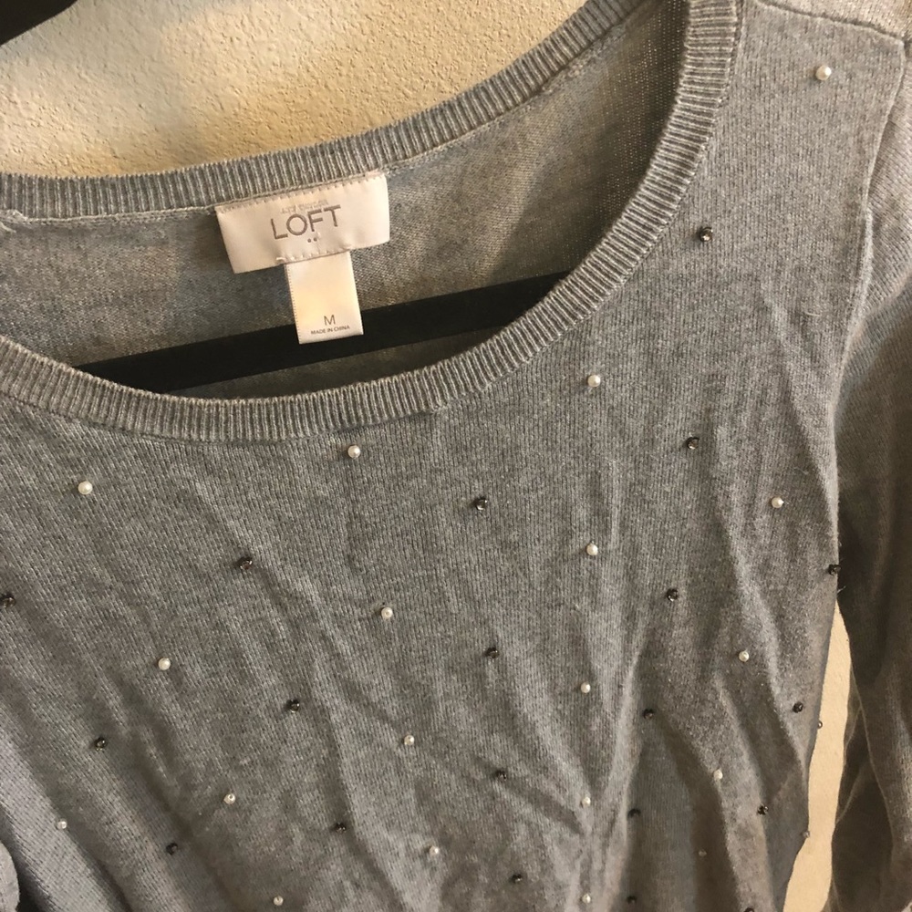 Lift sweater with studs